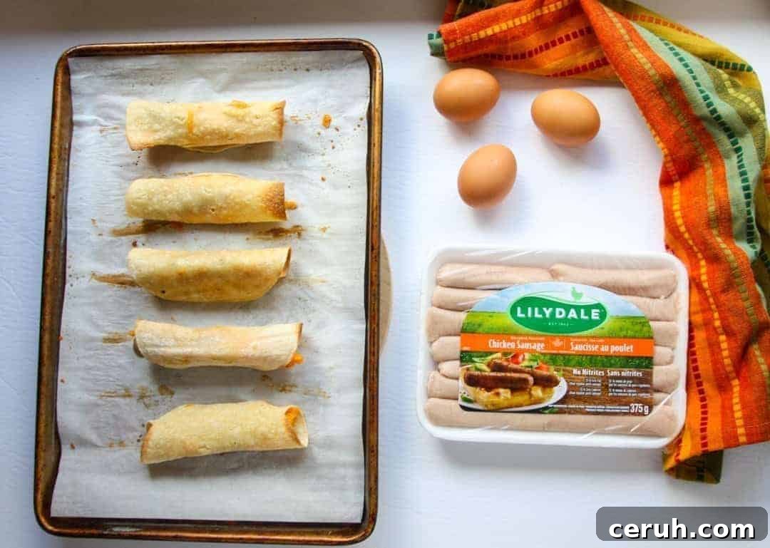 A tray of food on a table, with eggs and sausages