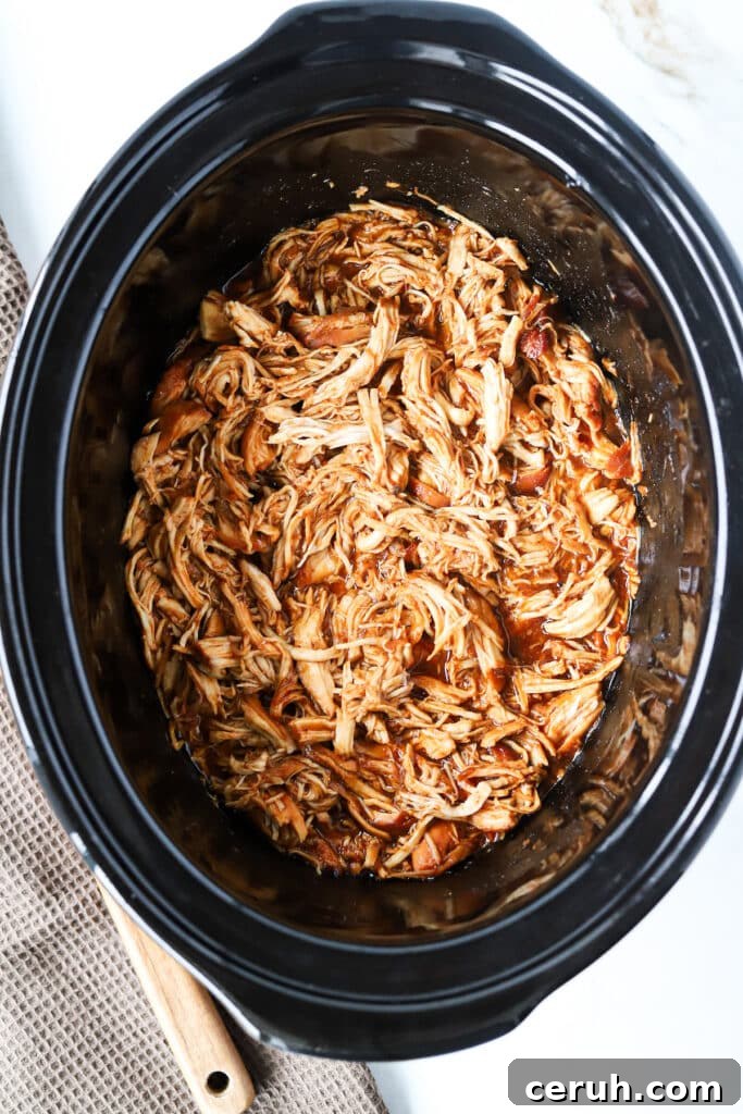 Slow cooker brown sugar bbq chicken finished in the crock pot.