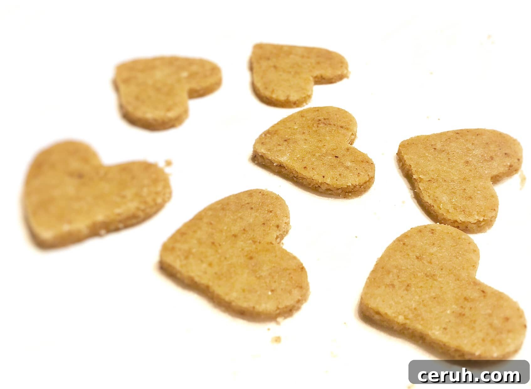 almond flour shortbread cookies in the shape of hearts