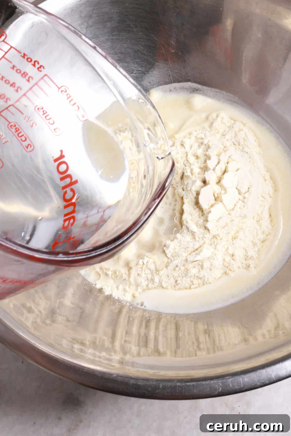 Pouring water on a bowl with masa marina