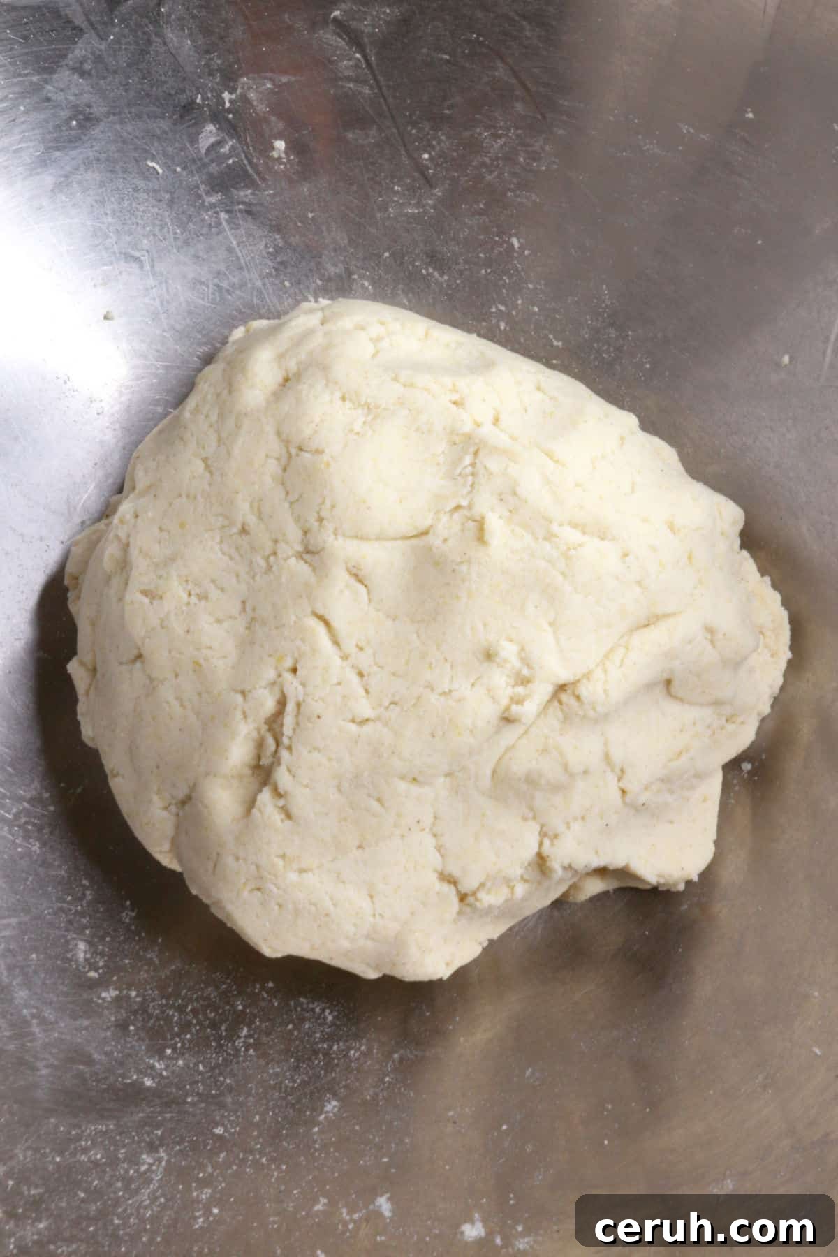 Ball of masa dough in a mixing bowl