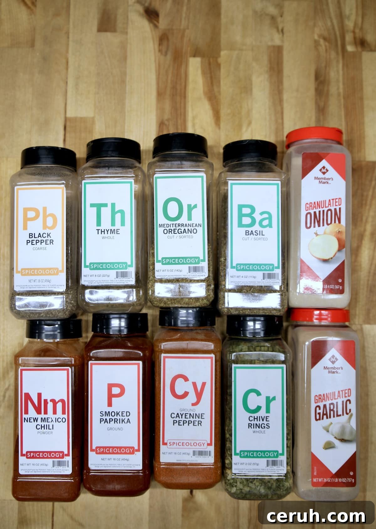 Ingredients for Creole Seasoning. Spice bottles for Creole seasoning.