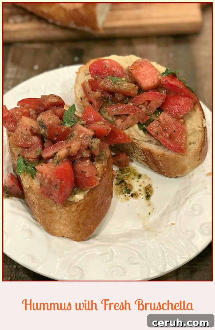 Creamy Hummus Topped with Fresh Bruschetta for Summer Entertaining 6 Finished hummus with bruschetta