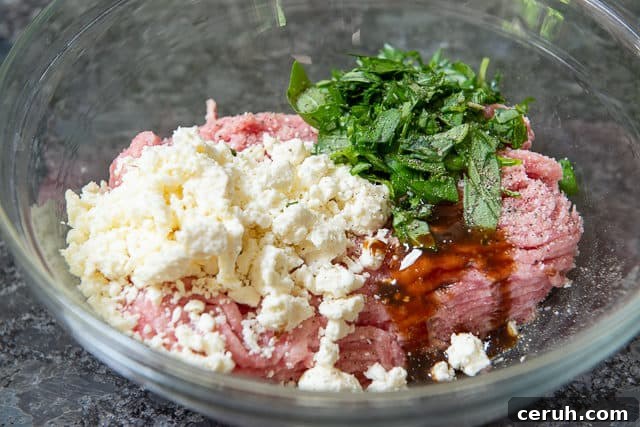 Juicy Turkey Burger Recipe with Flavorful Toppings 4 Ground Turkey, Feta and Basil in Bowl