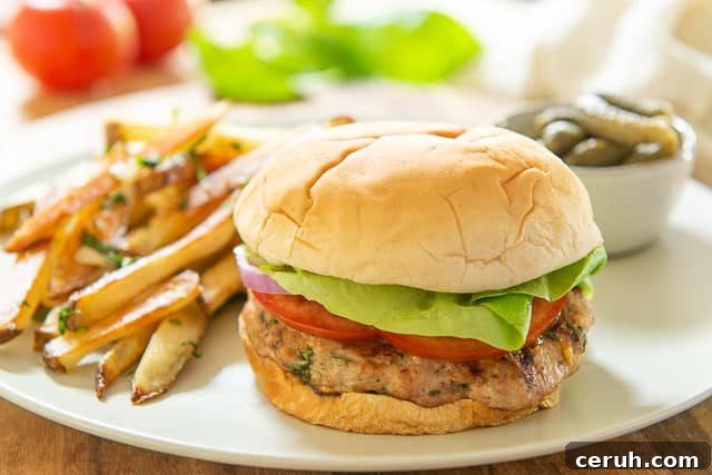 Juicy Turkey Burger Recipe with Flavorful Toppings 8 Turkey Feta Burger on Plate with Garlic Fries