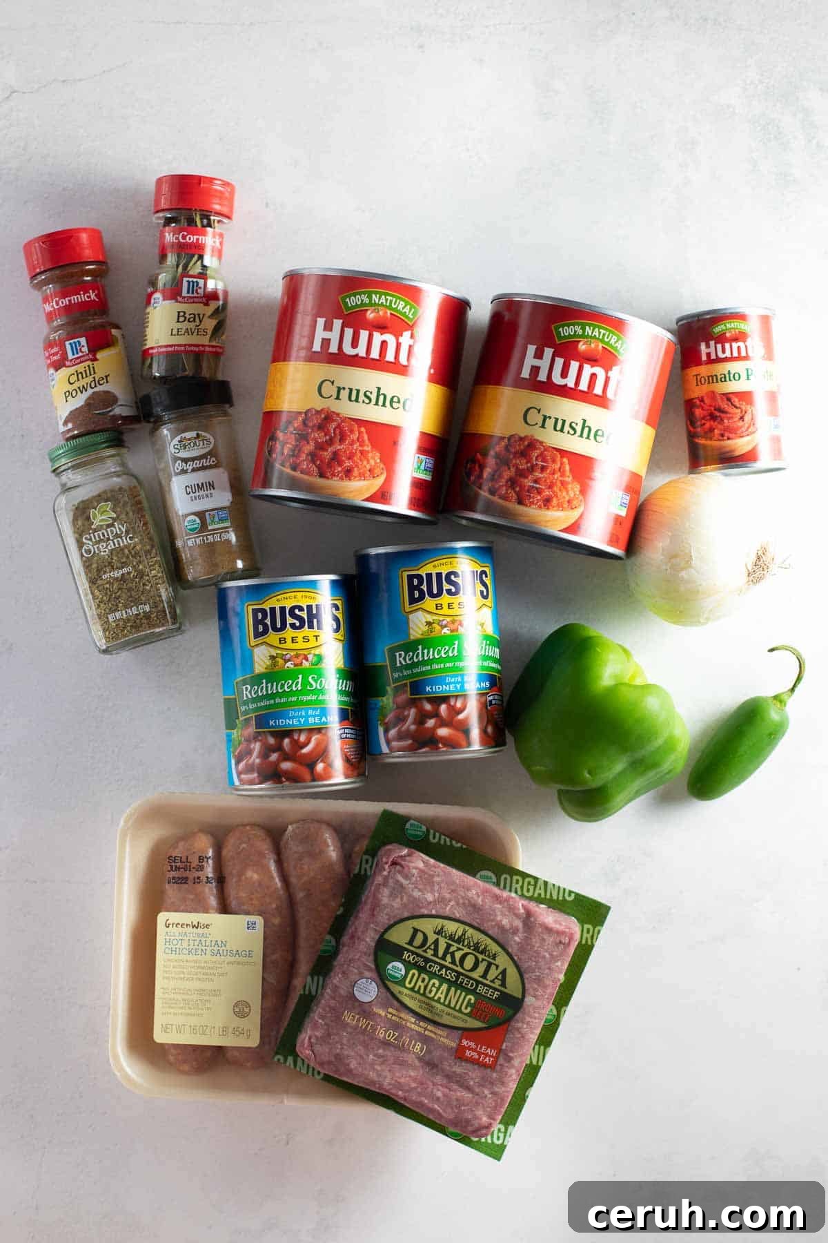 ingredients for gluten-free chili set out on marble background