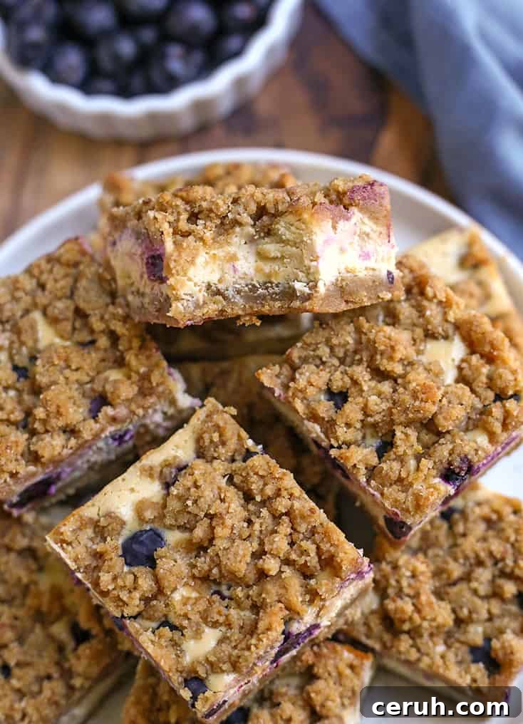 plate of gluten free blueberry cheesecake squares