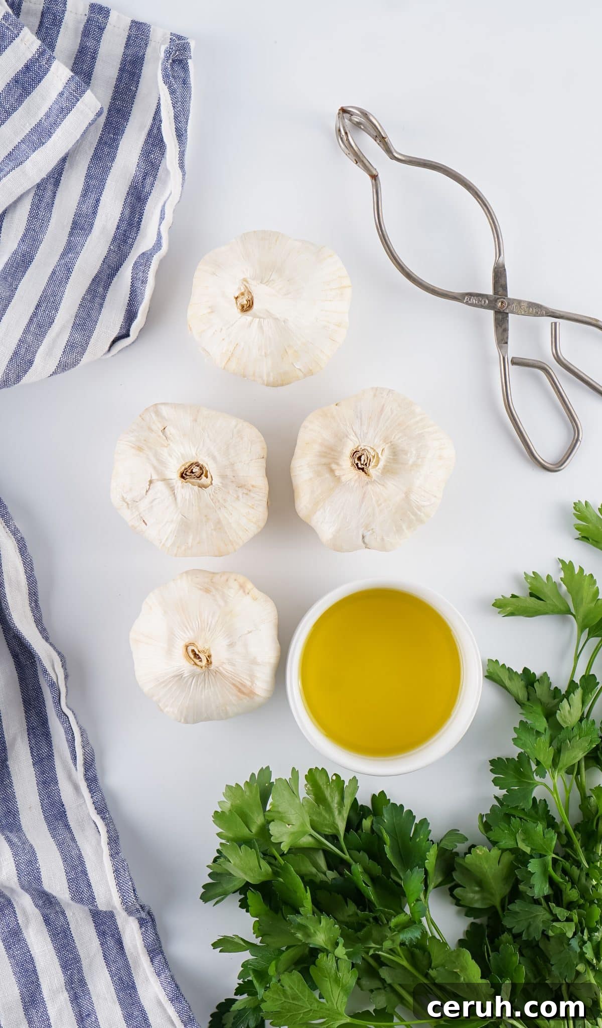 an overhead image showing the measured ingredients needed to make a batch of air fryer roasted garlic