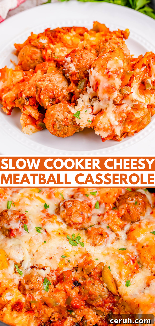 Plate of cheesy meatball casserole with melted cheese, tomatoes, and herbs, served on a white dish.