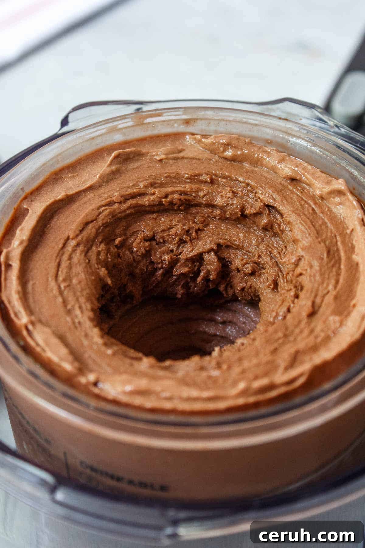 Ninja Creami Chocolate Protein Ice Cream in a pint container after being processed until smooth