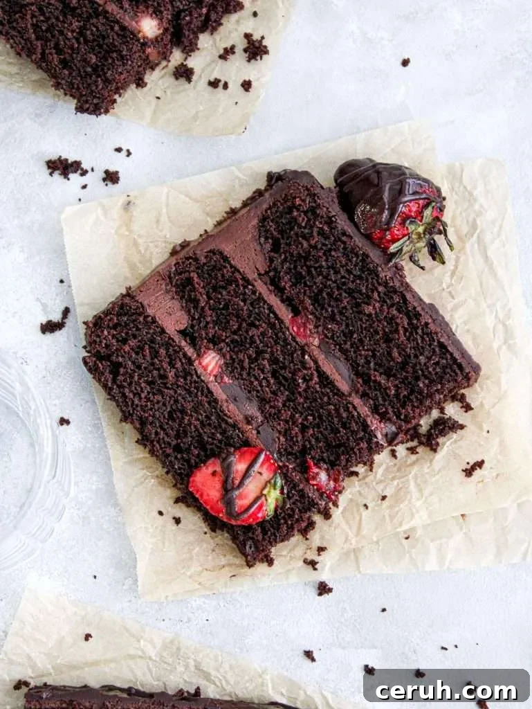 chocolate covered strawberry cake slice on parchment plate (2)