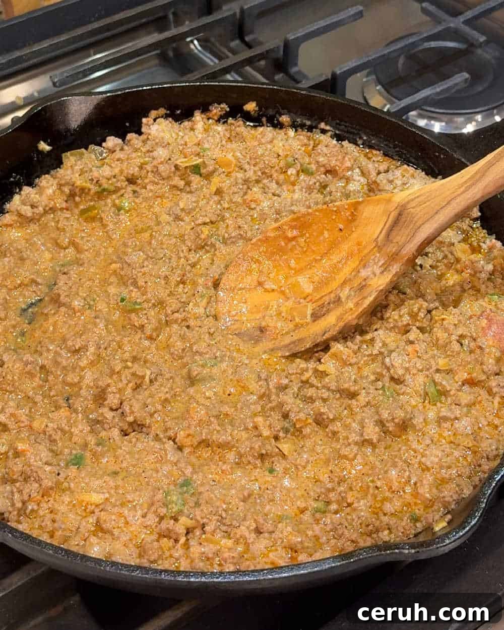 stir ground beef mixture with wooden spoon.