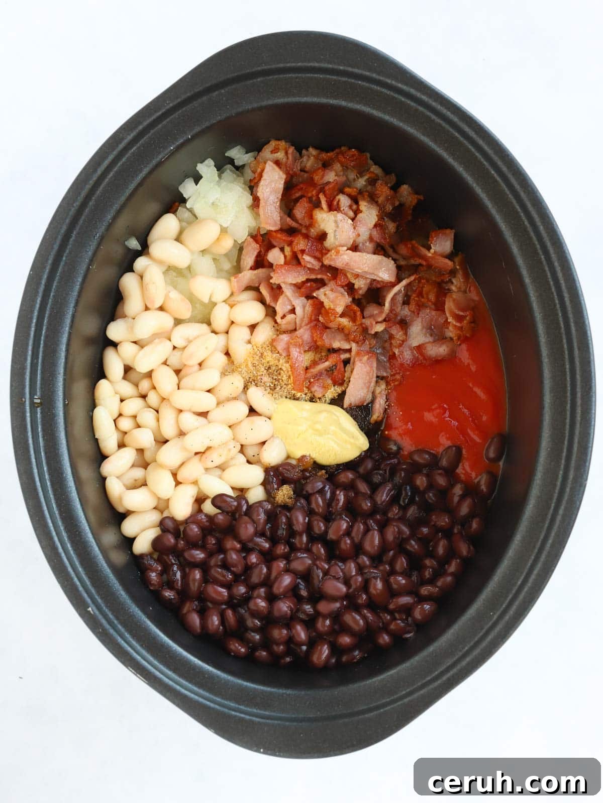 Raw ingredients for homemade baked beans cooked in the slow cooker