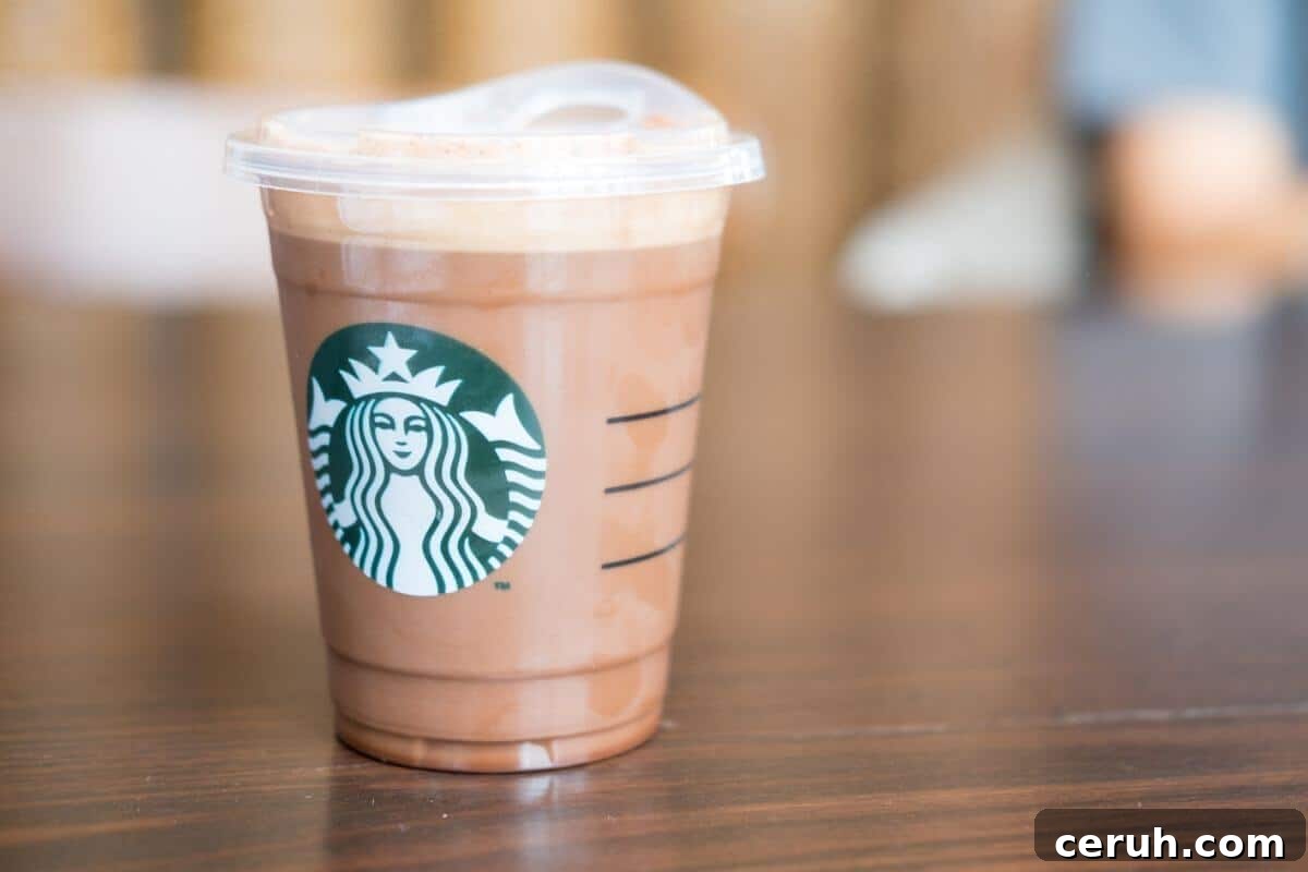 A secret menu Starbucks chocolate latte, beautifully presented on a table.