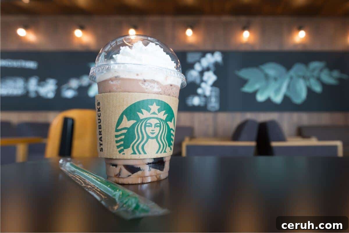 A secret menu Starbucks drink is sitting on top of a table.