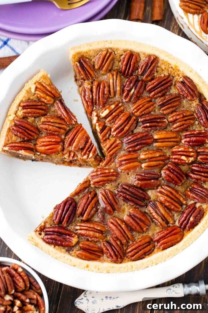 Overhead shot of homemade pecan pie sliced.