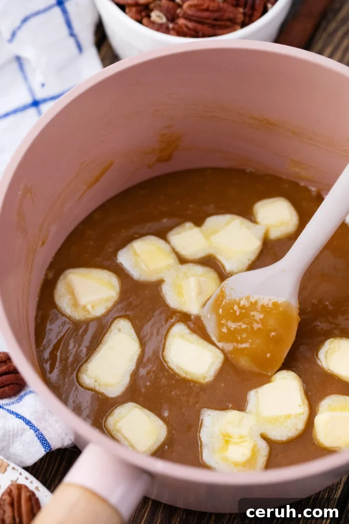 Stirring butter into pecan pie filling.