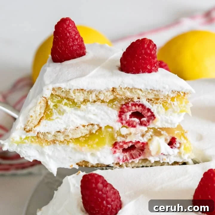 A slice of lemon icebox pie being pulled from the rest of the pie.