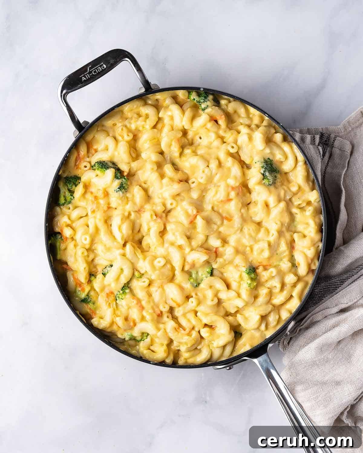 A pan of copycat panera broccoli cheddar mac and cheese.
