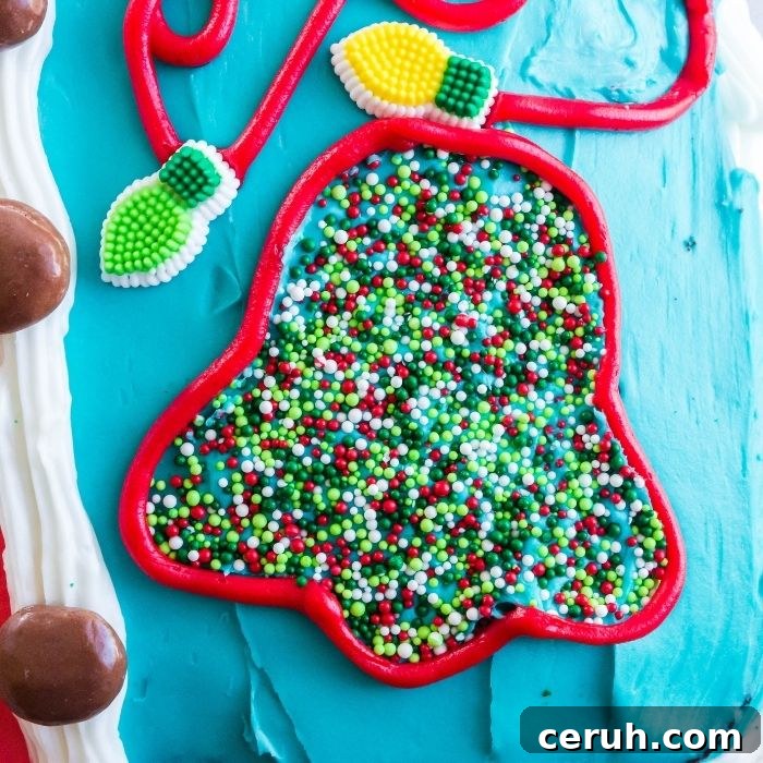 bell in sprinkles with icing around it on cake