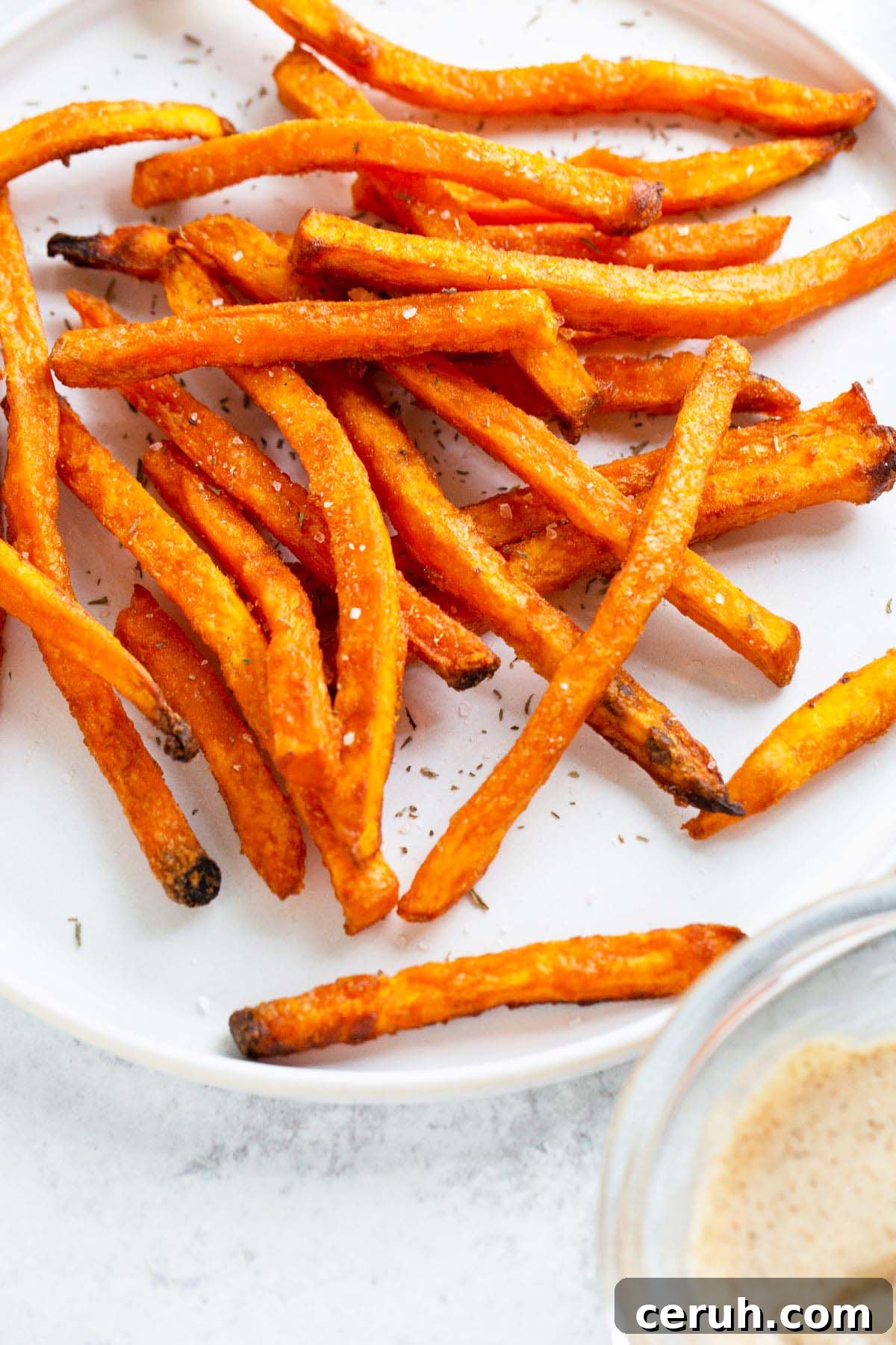 Sweet potato fries on a plate.