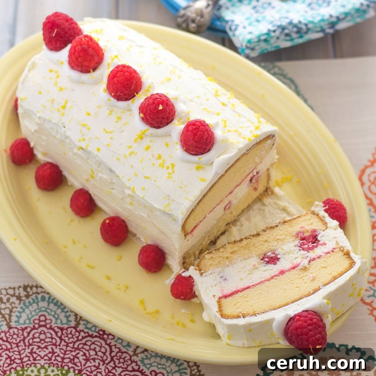 Raspberry and Lemon curd ice box cake on a serving platter.