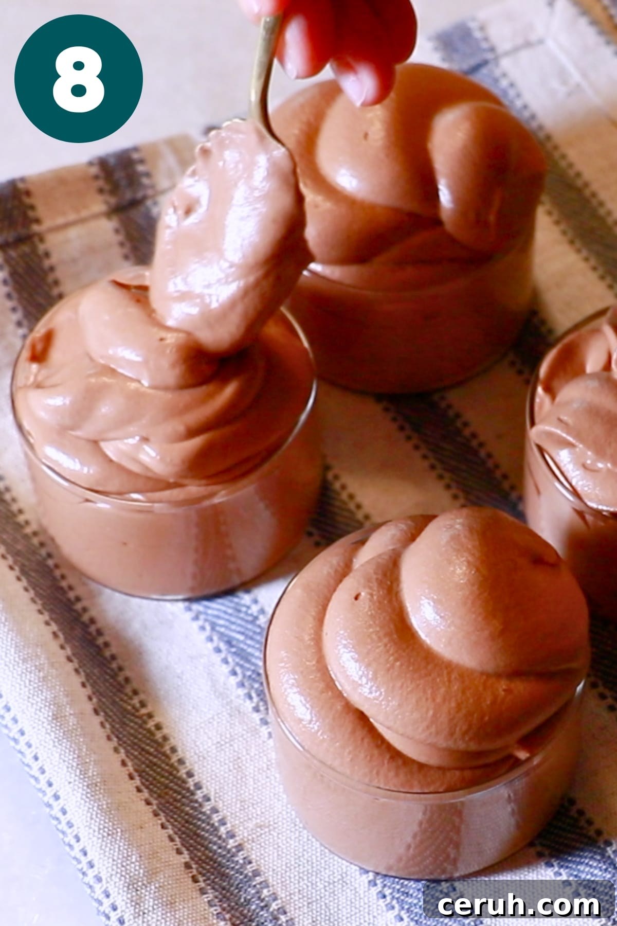 pouring chocolate mousse in glass cups