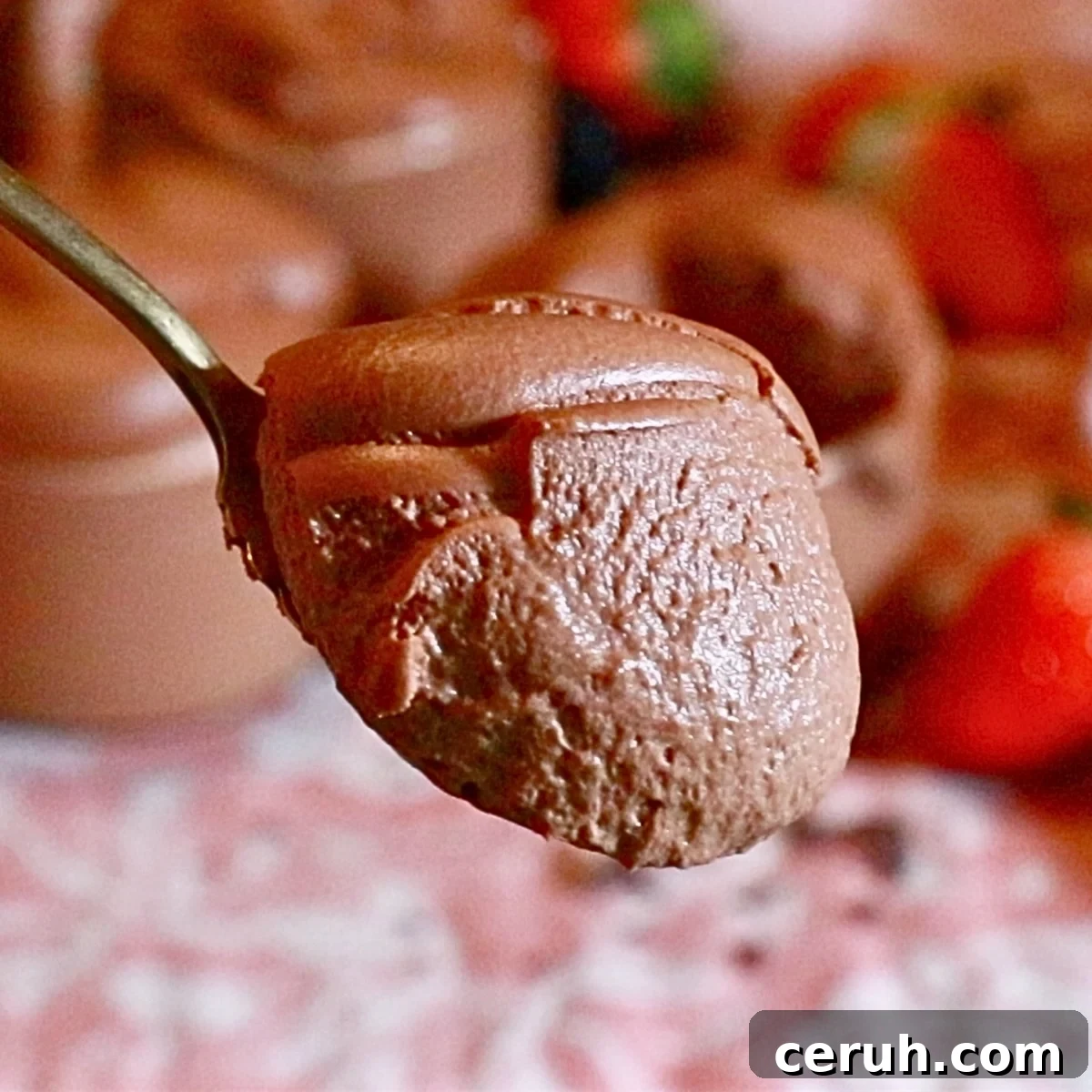 fluffy chocolate mousse on a spoon