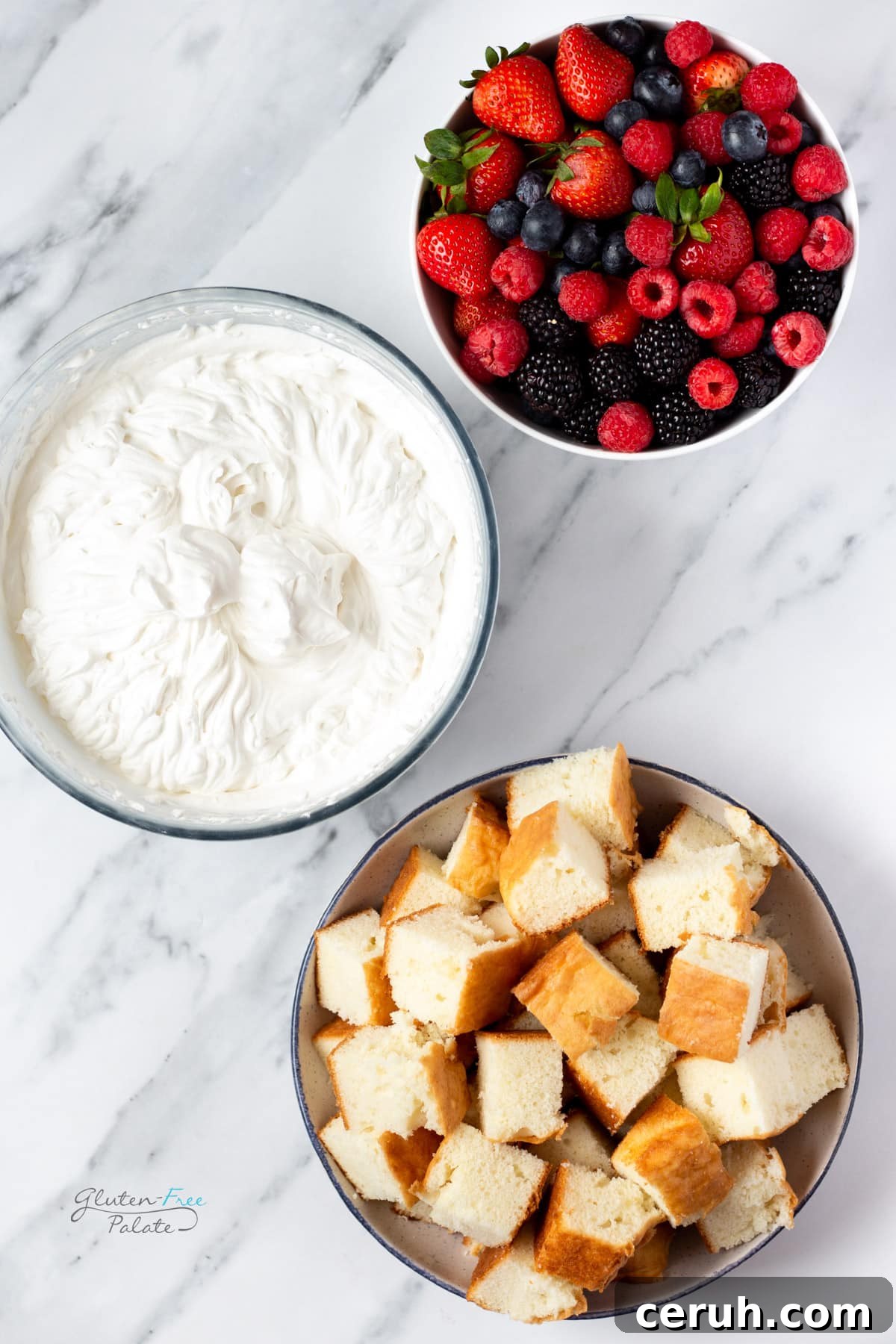 Gluten-Free Berry Trifle with Cake Layers and Whipped Cream 5 top down view of cake pieces, whipped cream, berries