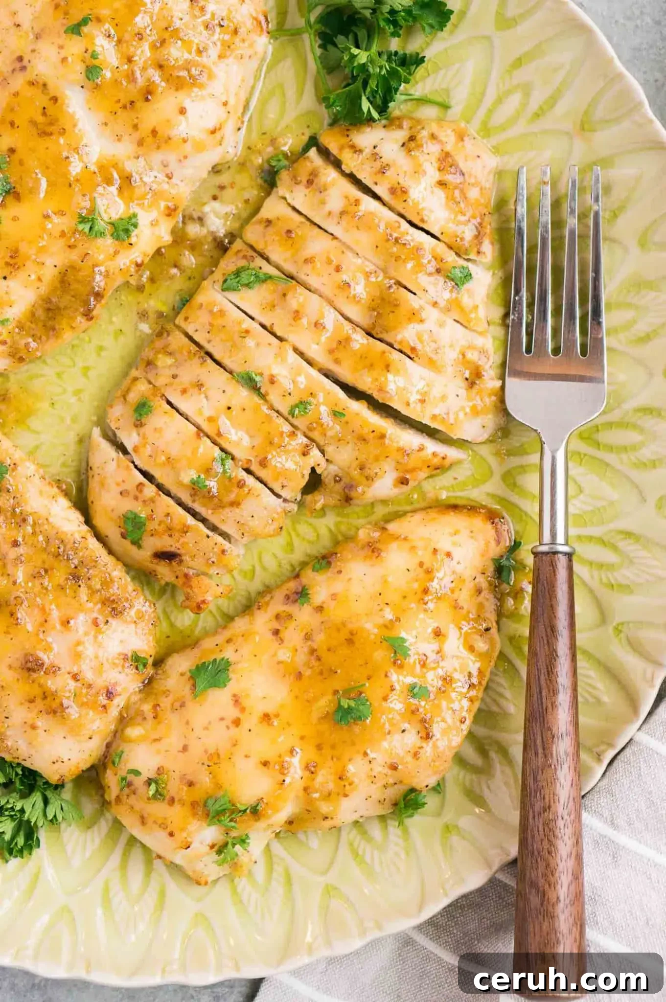 honey mustard chicken recipe on a plate with a fork