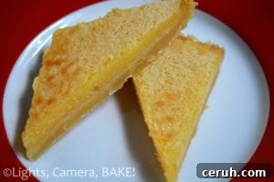 Sticky Lemon Bars Recipe (Video Guide) 3 Sticky Lemon Slice. A shortbread like base with a sweet yet tangy lemon topping! The texture is very melt in the mouth, almost like a custard!