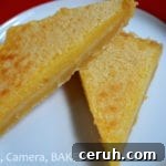 Sticky Lemon Slice. A shortbread like base with a sweet yet tangy lemon topping! The texture is very melt in the mouth, almost like a custard!