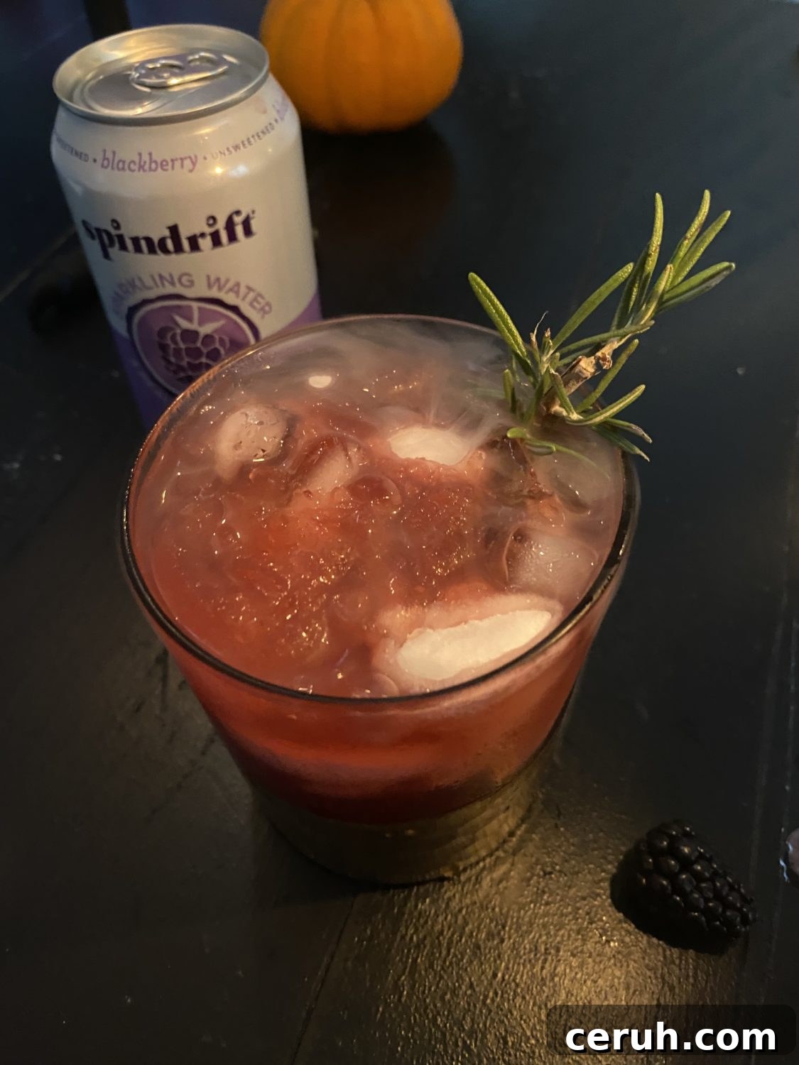 Blackberry Widow Cocktail Recipe for Halloween Parties 4 halloween cocktail in candlelight