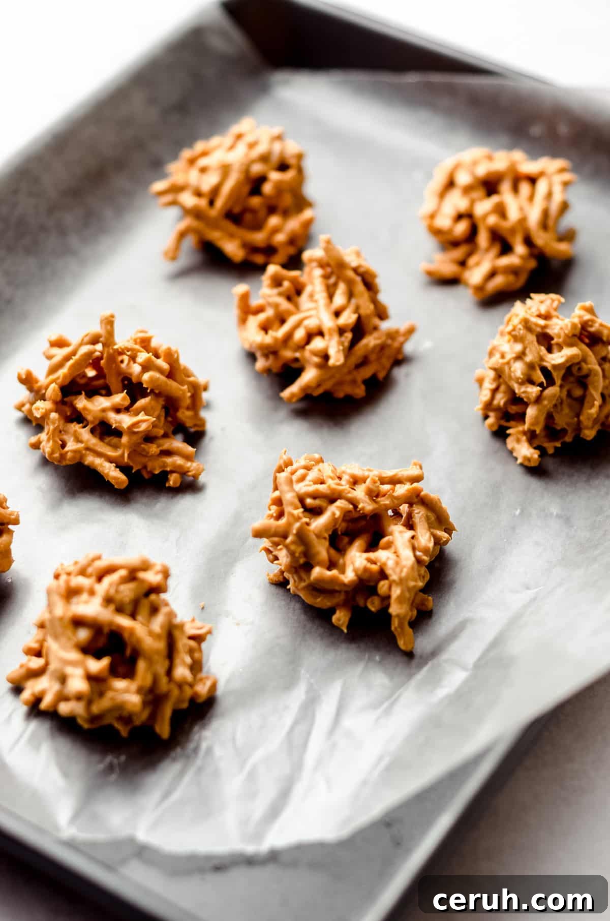 Chewy Butterscotch Haystack Cookies Recipe for Crowd-Pleasing Treats 13 A baking sheet with mounts of butterscotch haystack cookies.