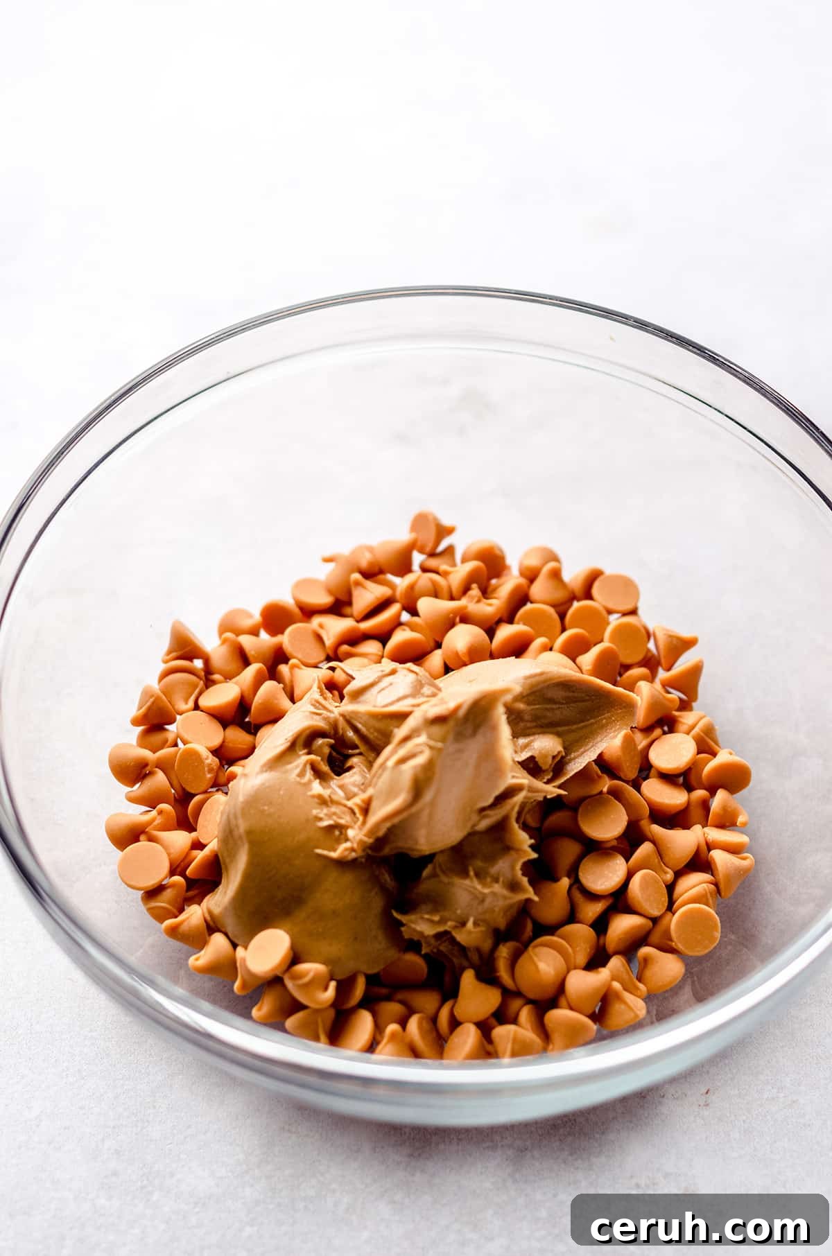Chewy Butterscotch Haystack Cookies Recipe for Crowd-Pleasing Treats 7 A bowl with butterscotch chips and peanut butter.