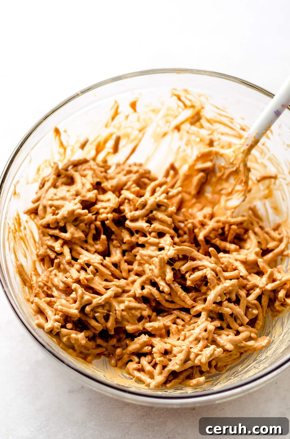 Chewy Butterscotch Haystack Cookies Recipe for Crowd-Pleasing Treats 10 Stirring together a peanut butter and melted butterscotch blend with chow mein noodles.