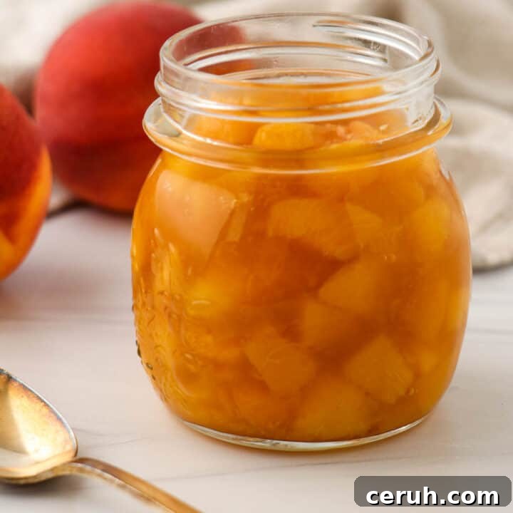 Close up of a jar of Quick and Easy Peach Compote.