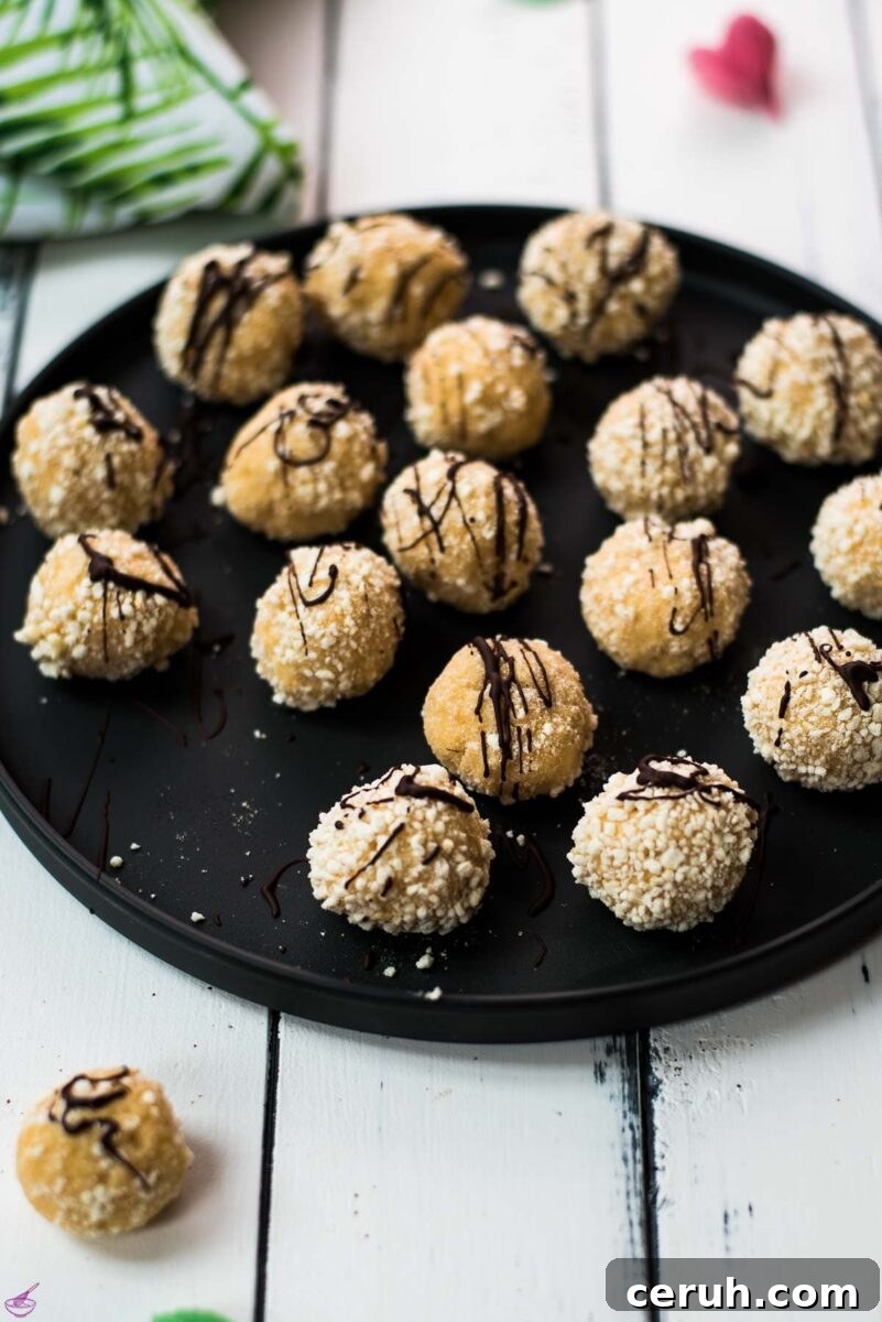 Eggnog Mascarpone Cookies: Christmas Spice Cookie Recipe 11 Gorgeous mascarpone eggnog cookies, rolled in ladyfinger crumbs and drizzled with chocolate sauce.