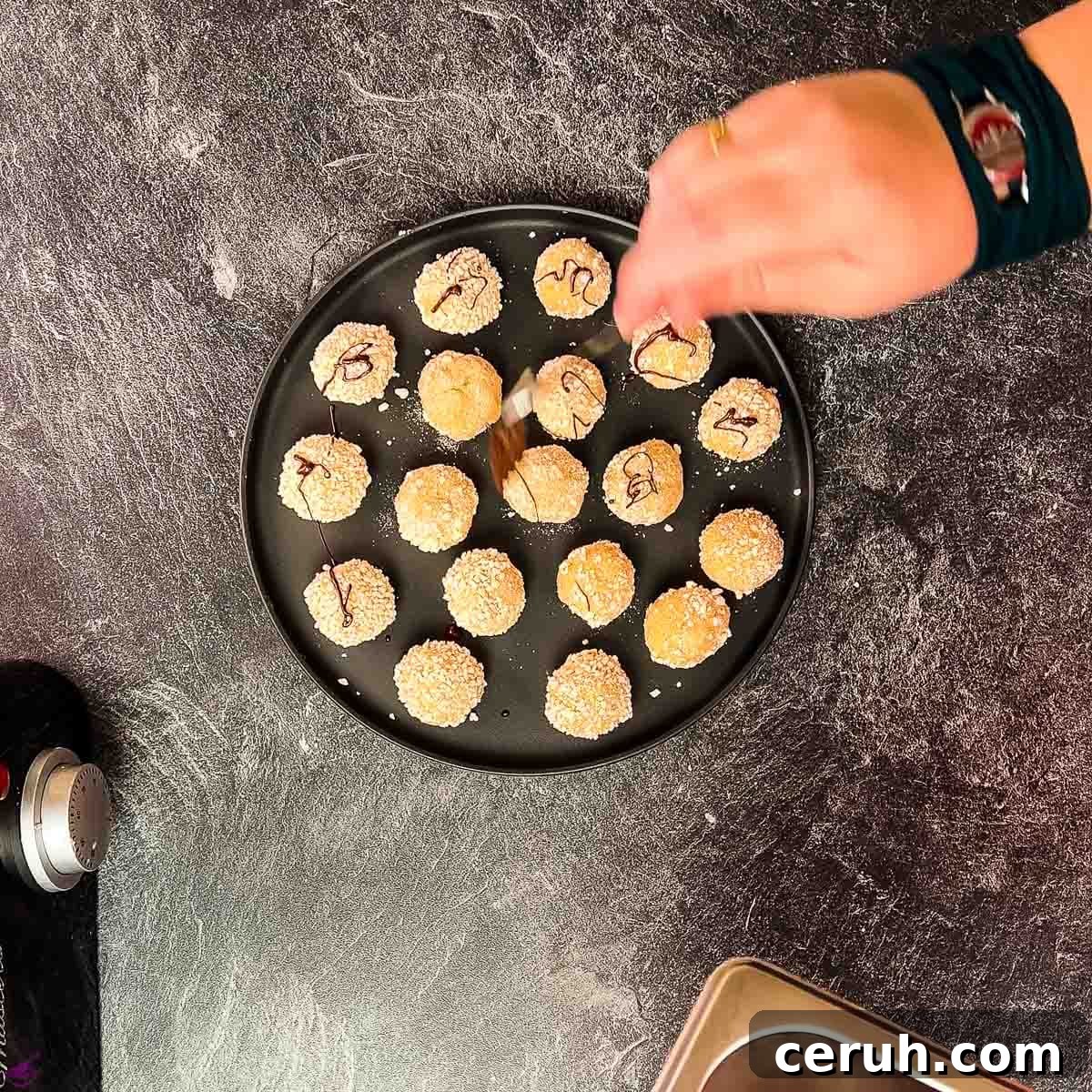 Eggnog Mascarpone Cookies: Christmas Spice Cookie Recipe 8 Drizzle the mascarpone cookies with chocolate sauce.