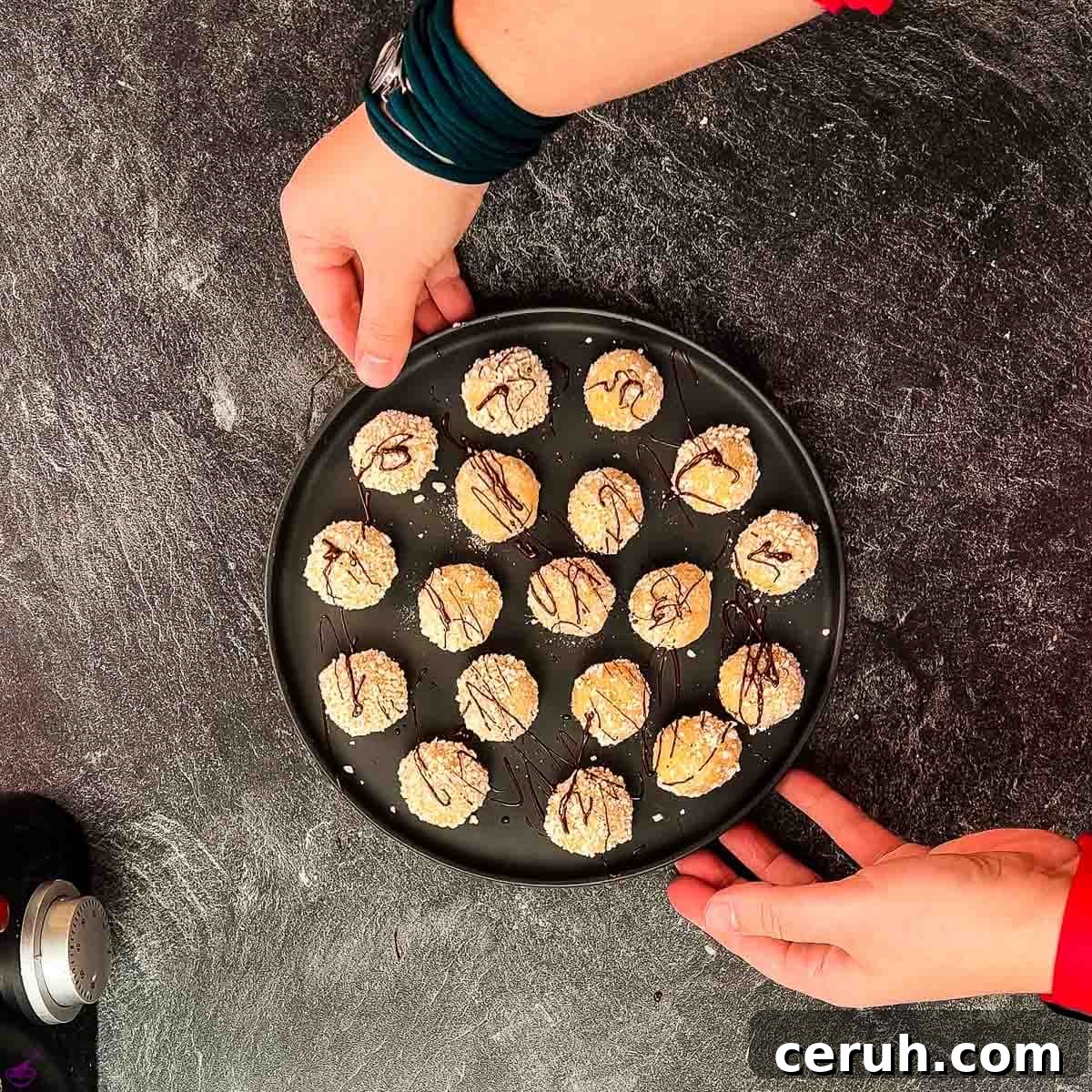 Eggnog Mascarpone Cookies: Christmas Spice Cookie Recipe 9 Gorgeous mascarpone eggnog cookies, rolled in ladyfinger crumbs and drizzled with chocolate sauce.