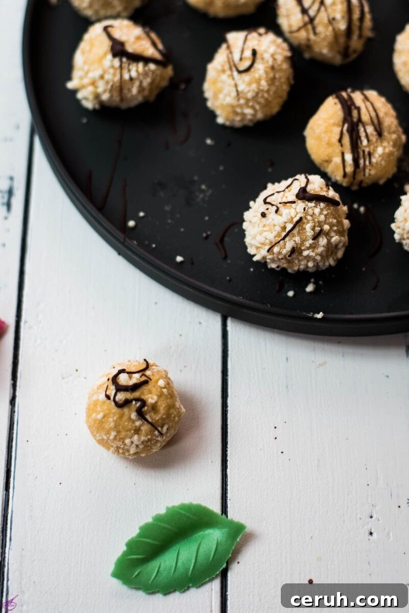 Eggnog Mascarpone Cookies: Christmas Spice Cookie Recipe 10 Gorgeous mascarpone eggnog cookie, rolled in ladyfinger crumbs and drizzled with chocolate sauce.