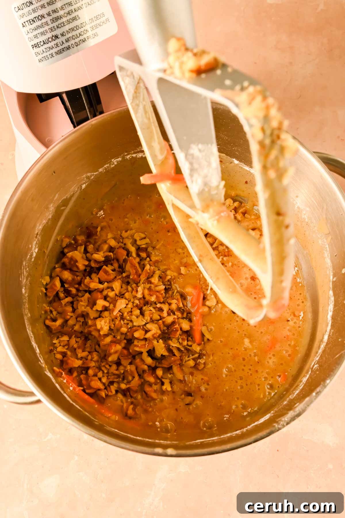 Mixing wet ingredients for simple Carrot Cake.