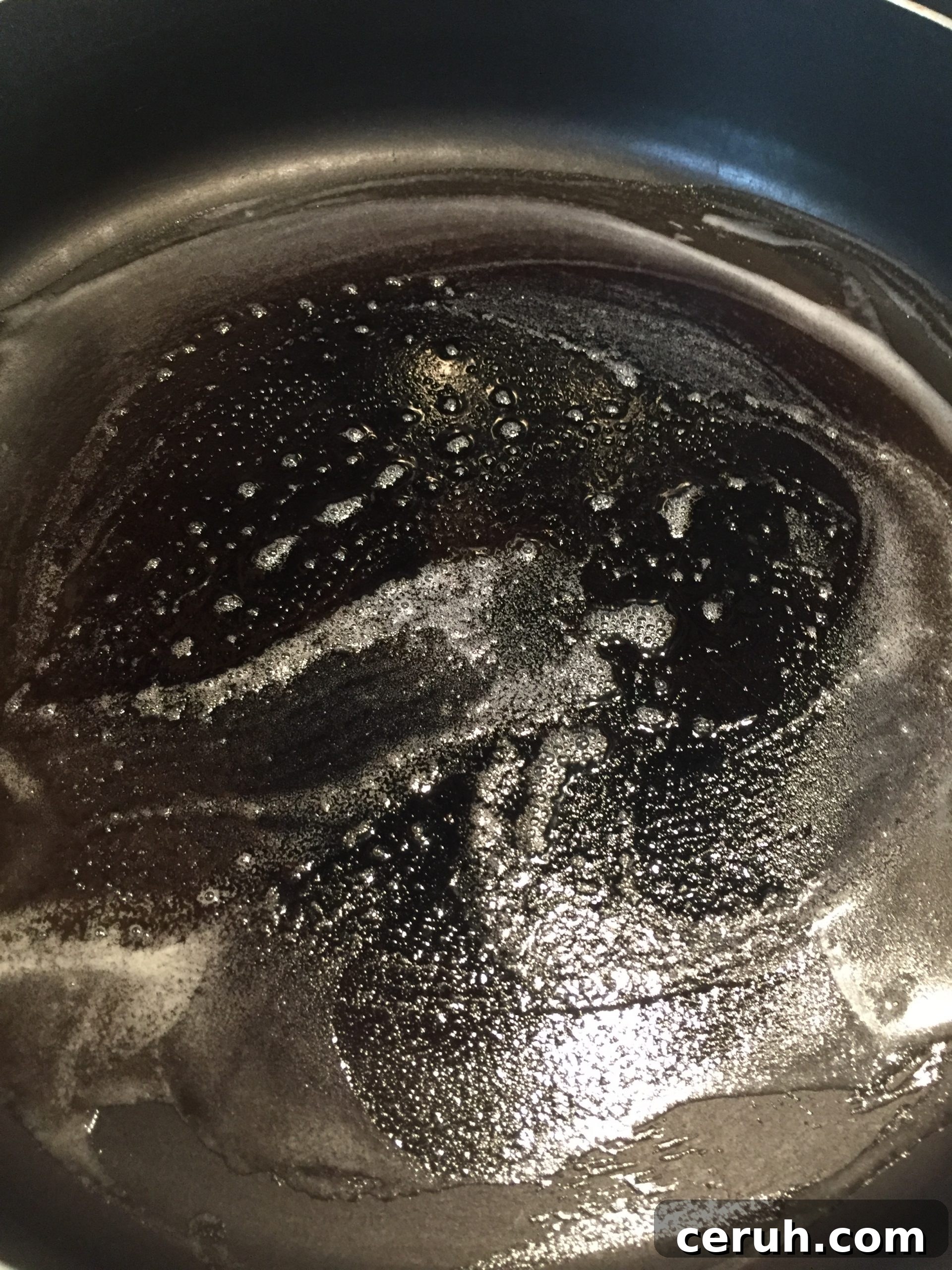 Melted butter in pan for grilling sanwiches