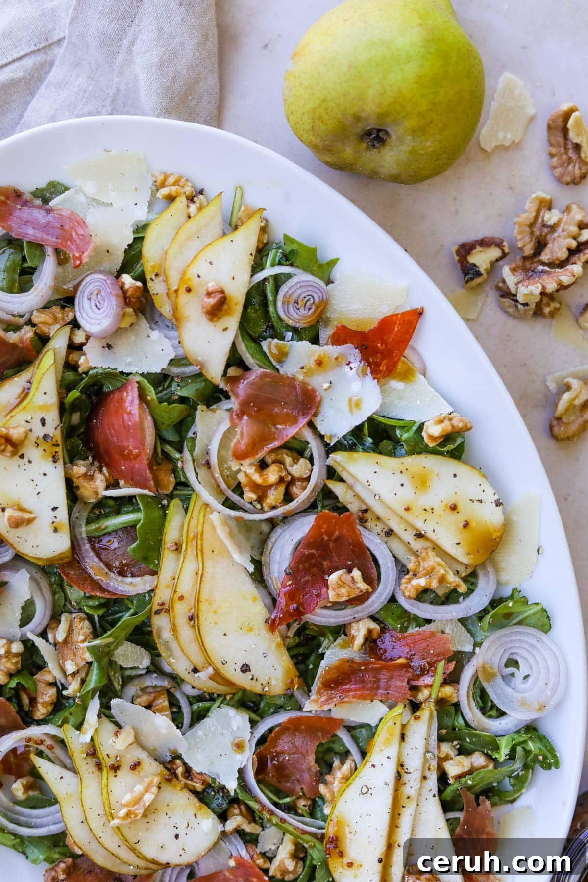 Crumbled crispy prosciutto on a salad.