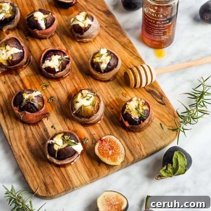 Prosciutto-Wrapped Figs with Goat Cheese Appetizer on serving board.