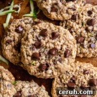 Soft Chewy Gluten-Free Zucchini Cookies That Stay Moist 10 overhead shot of zucchini cookies with melty chocolate chips on top.