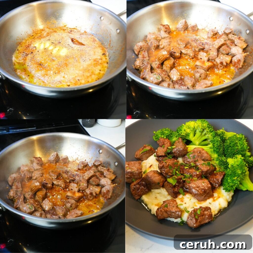 Juicy garlic butter steak bites cooking in a pan.