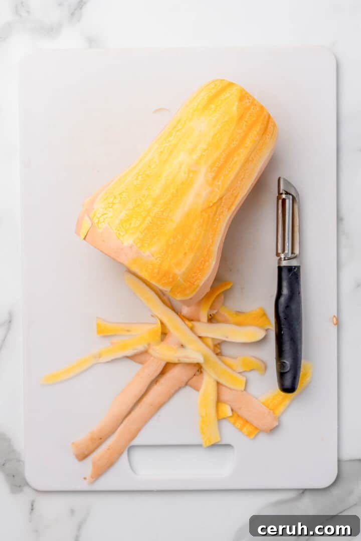 peeling the butternut squash.