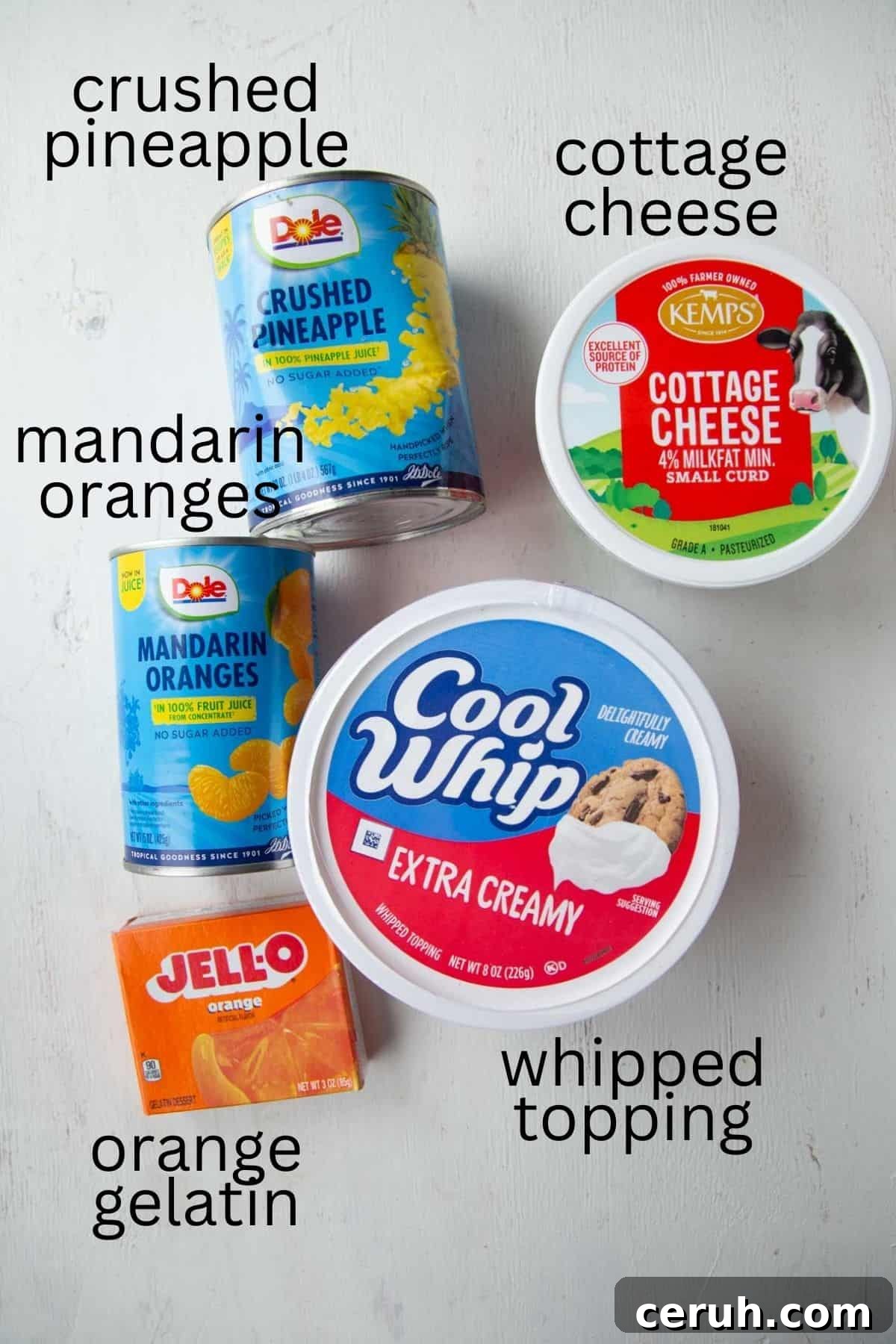 cool whip, mandarin oranges, pineapple, orange gelatin, and crushed pineapple.