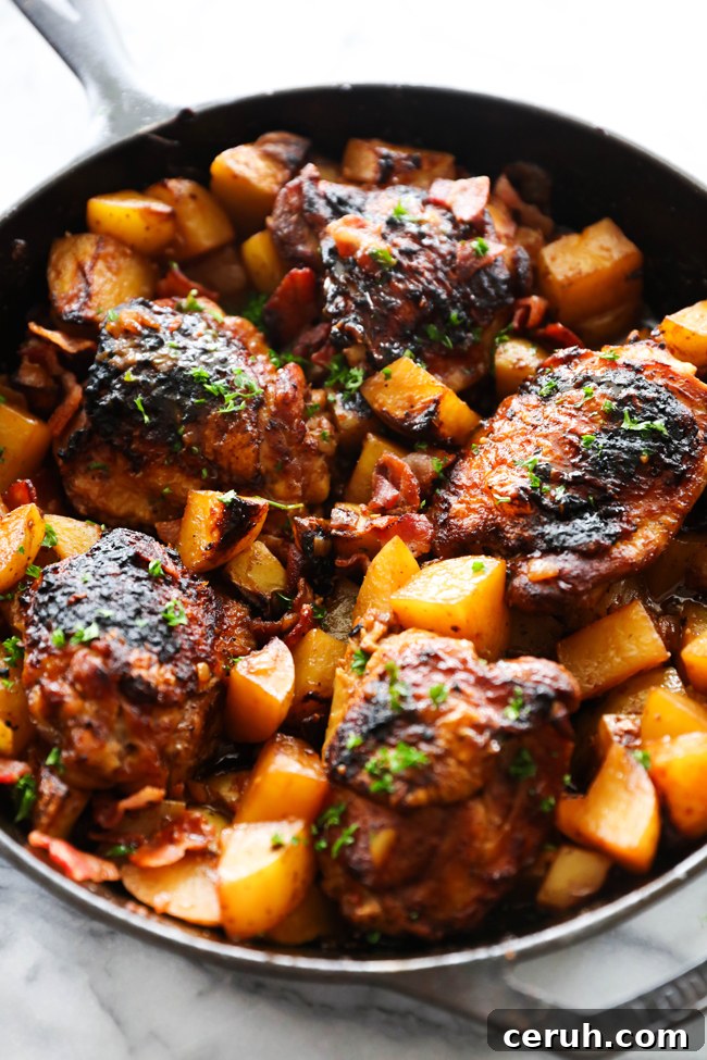 Braised Dijon Chicken and Potatoes plated one skillet meal
